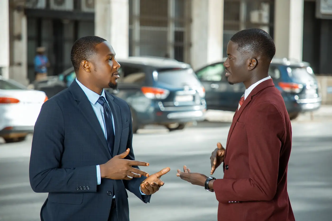 Colleagues talking outside their workplace
